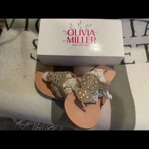 Rhinestone flip flops.